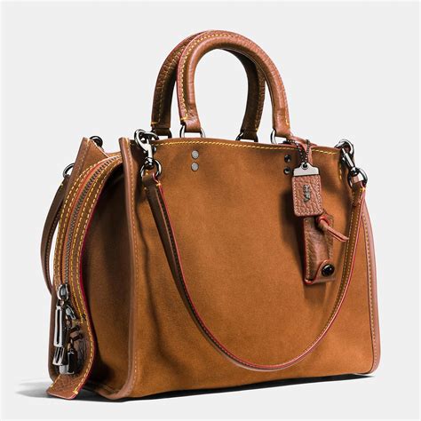 Coach Women's Bags & Camel Exterior for sale .